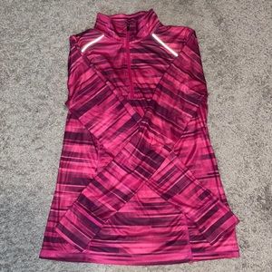 Workout top with thumb cut outs